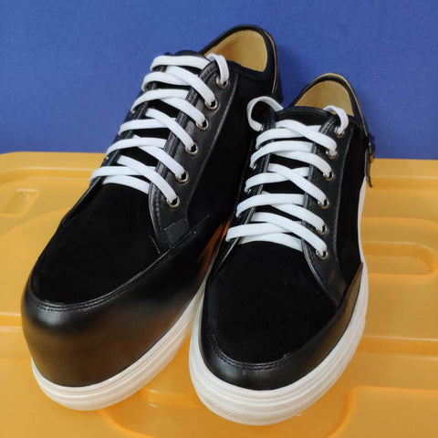 zapatos de discrepancia hasta la pierna